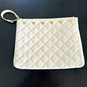 Betsey Johnson white, quilted travel bag with gold hearts.
